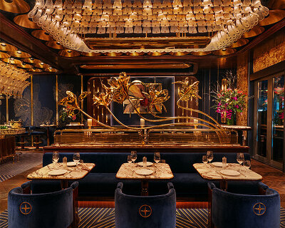 sculptural brass petals and silk embroideries detail isabel mayfair restaurant in abu dhabi