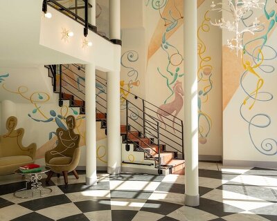 vincent darré brings new life to historic paris theater with le magnifique hotel