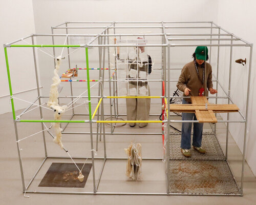 metal pipe grid transforms personal rituals of control into participatory playground